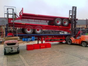 Forklifts Loading Agricultural Trailers